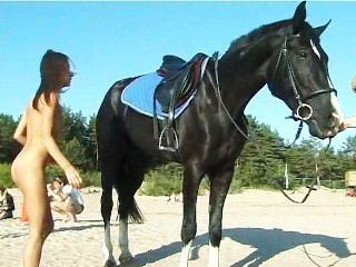 girlfriend riding at the beach