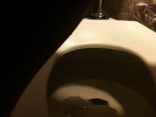 pissing public toilet